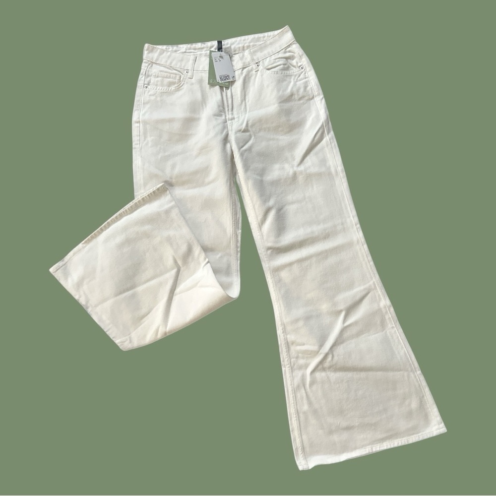 White H&M divided jeans. New with tags. Size 8